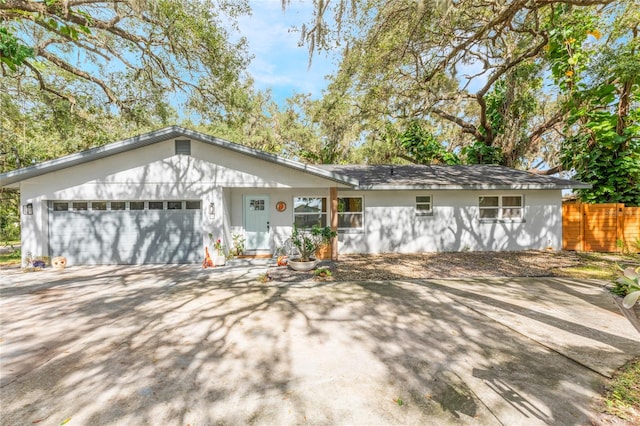 single story home featuring a garage