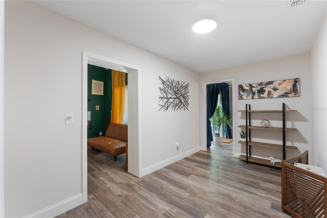 interior space with hardwood / wood-style floors