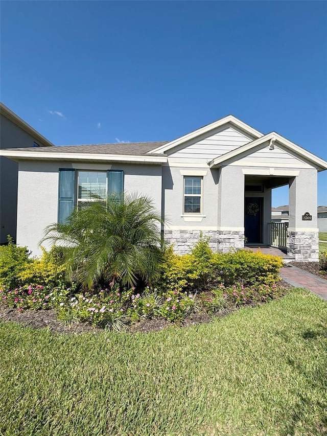 view of front of home with a front yard