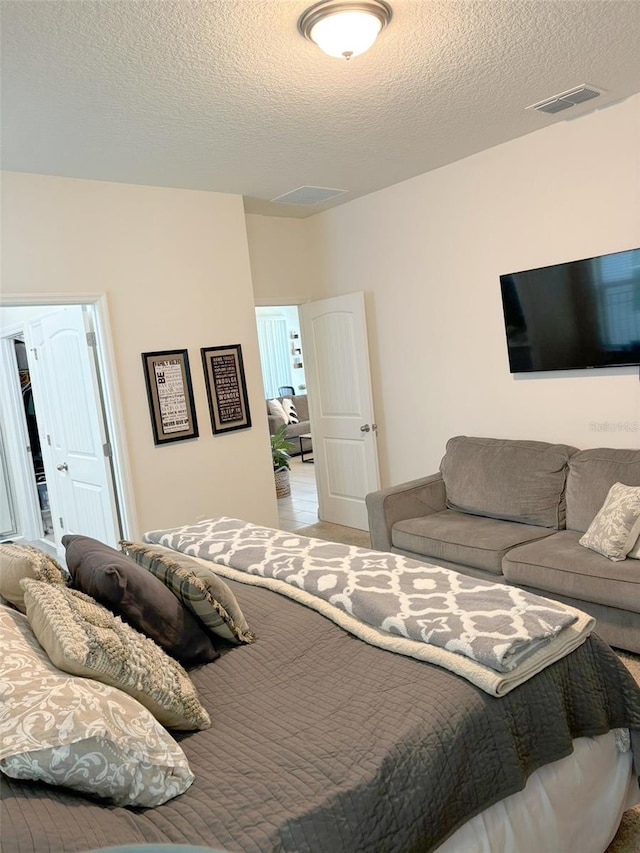 bedroom with a textured ceiling