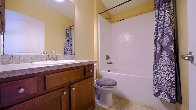 full bathroom with toilet, vanity, and shower / tub combo with curtain