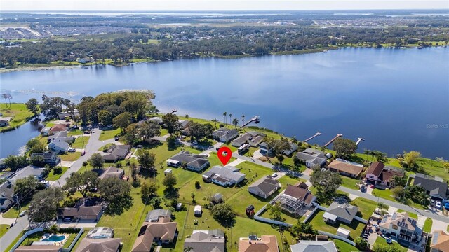 1395 Emerald Dr, Kissimmee, FL 34744 - aerial view of property's location featuring a nearby body of water and nearby suburban area