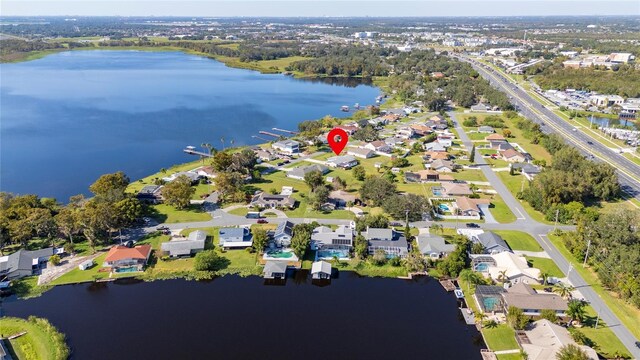 1395 Emerald Dr, Kissimmee, FL 34744 - view of property location featuring a large body of water and nearby suburban area
