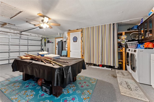 rec room with ceiling fan, a textured ceiling, billiards, and washing machine and clothes dryer