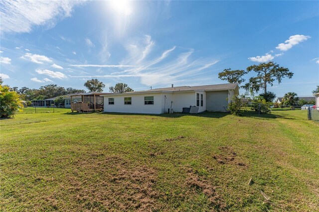 1395 Emerald Dr, Kissimmee, FL 34744 - view of rear view of house