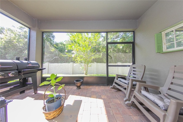 sunroom featuring a healthy amount of sunlight