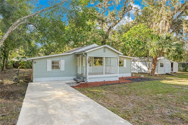 view of front of house featuring a front lawn and a porch