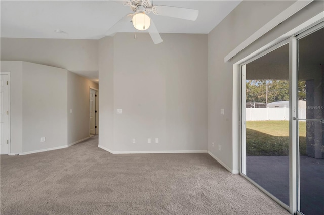 carpeted empty room featuring ceiling fan