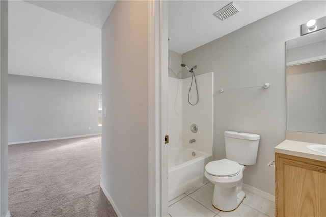 full bathroom featuring tile patterned flooring, washtub / shower combination, vanity, and toilet