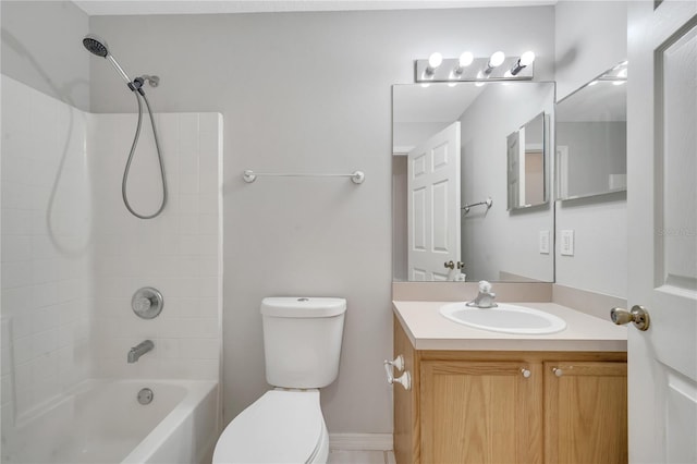 full bathroom featuring toilet, vanity, and shower / bathing tub combination