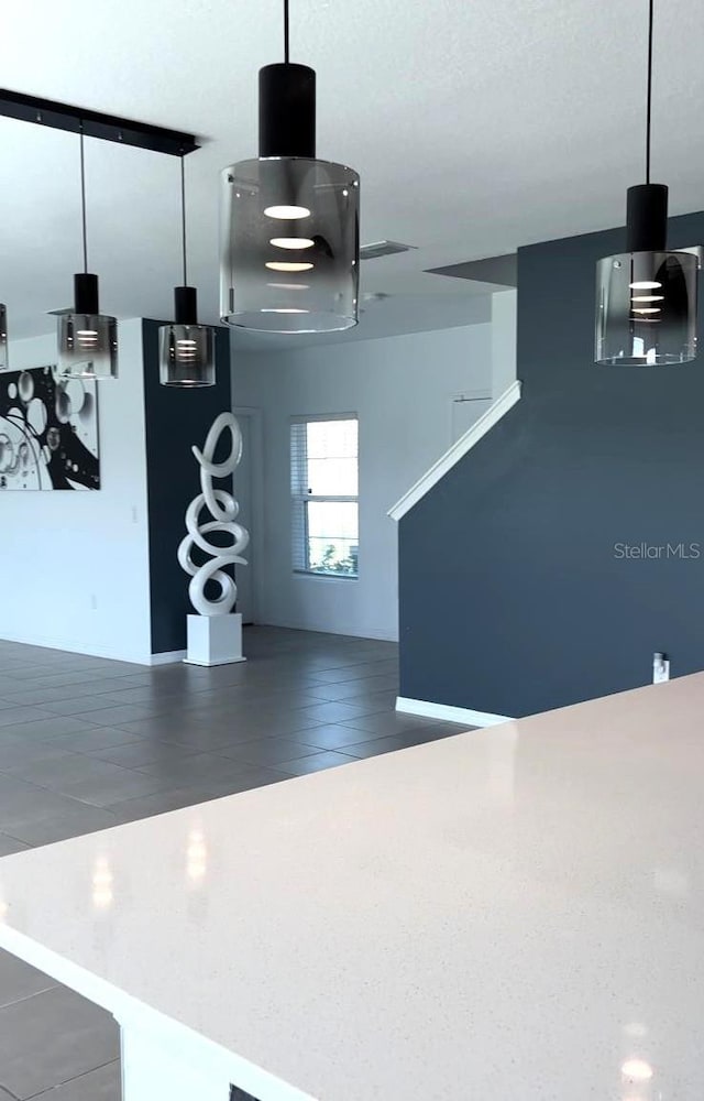 interior space featuring a textured ceiling