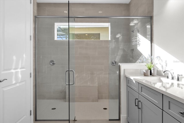 bathroom featuring vanity and walk in shower