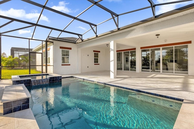 view of swimming pool with an in ground hot tub, a patio, and a lanai