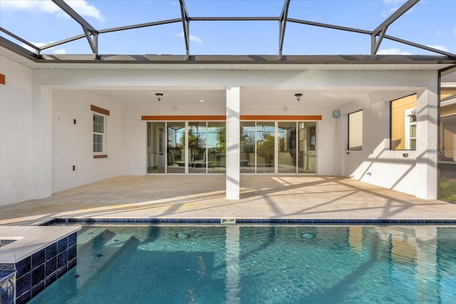 rear view of house featuring a patio and a lanai