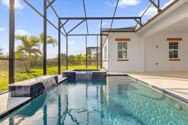 view of swimming pool with an in ground hot tub, pool water feature, a patio area, and a lanai