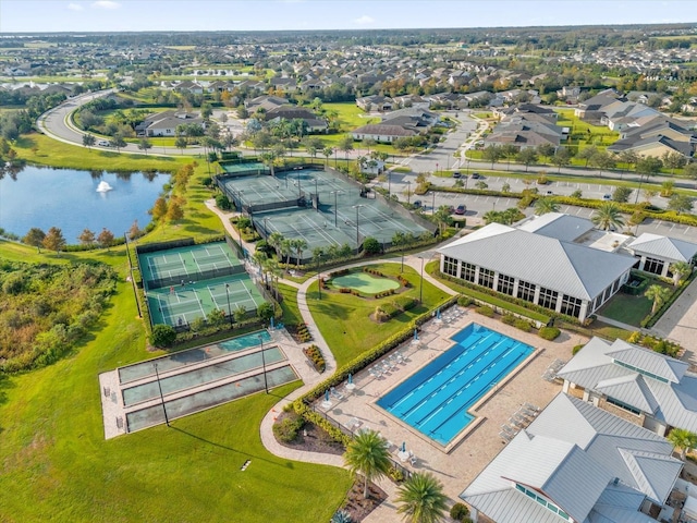 bird's eye view with a water view