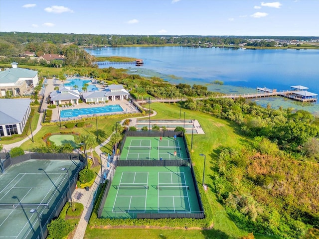 birds eye view of property with a water view