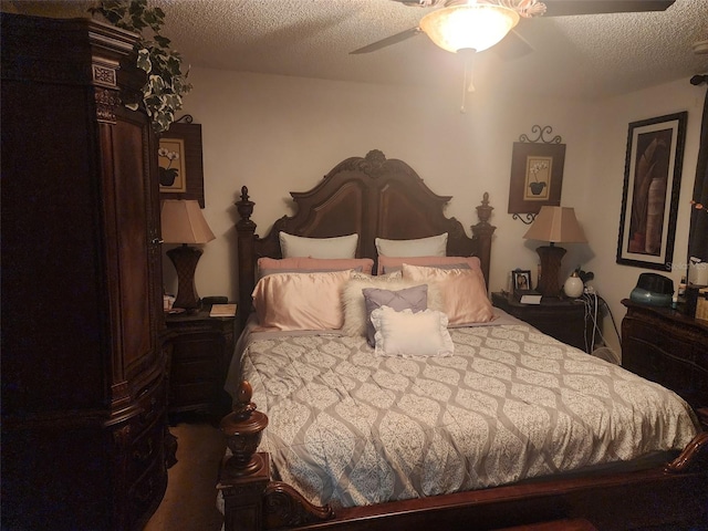 bedroom featuring a textured ceiling and ceiling fan