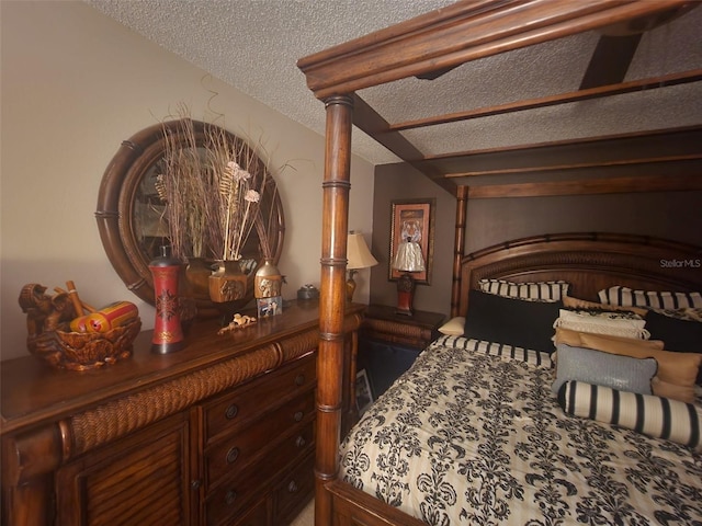 bedroom featuring a textured ceiling