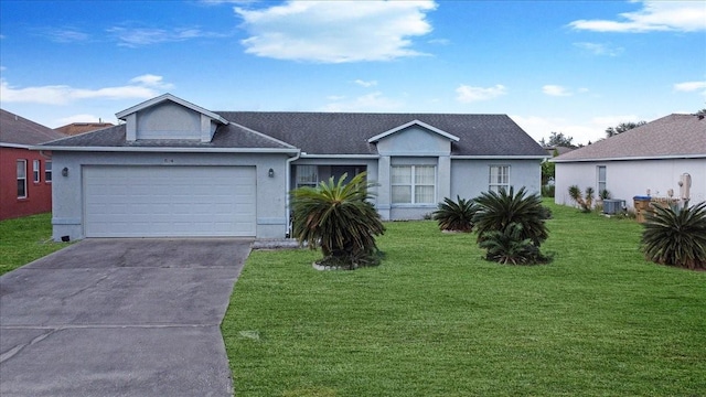 single story home with a front yard and a garage