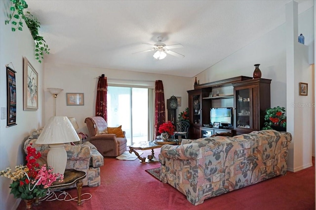 living room with vaulted ceiling, carpet flooring, and ceiling fan