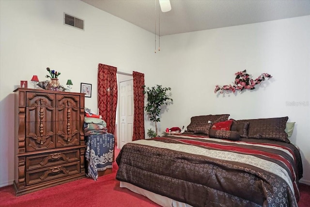 bedroom with ceiling fan and carpet floors