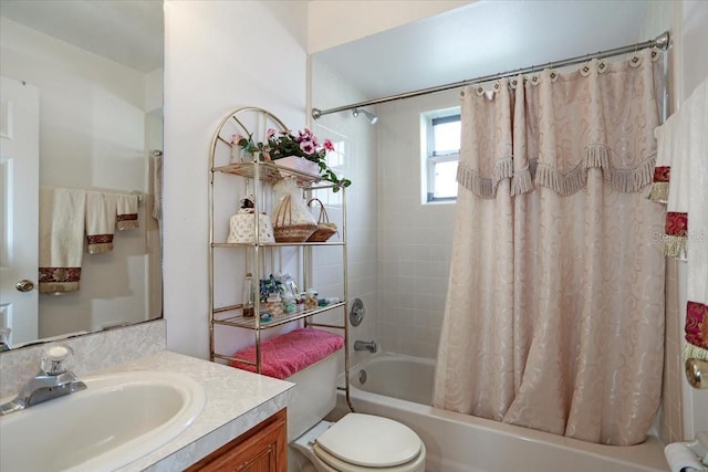 full bathroom featuring vanity, toilet, and shower / bath combo with shower curtain