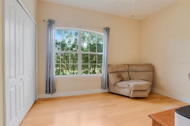 sitting room with light hardwood / wood-style floors