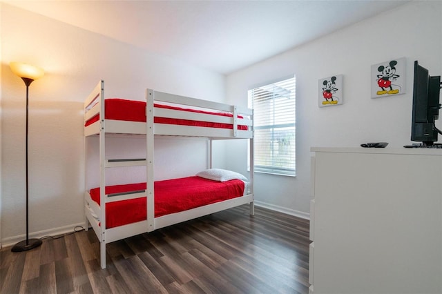 bedroom featuring dark hardwood / wood-style flooring