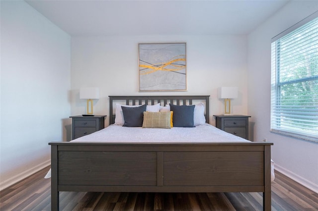 bedroom featuring dark wood-type flooring