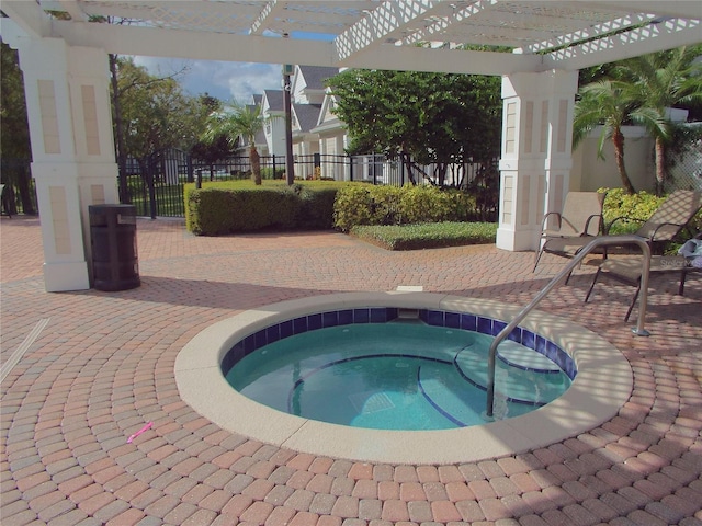 view of pool with a pergola, a hot tub, and a patio area