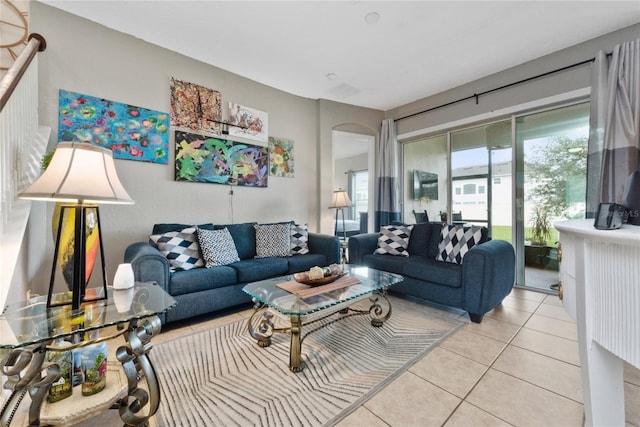 living room with light tile patterned floors