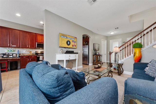 living room featuring light tile patterned flooring