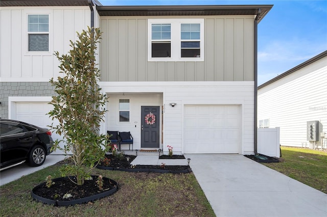 view of front of property with a garage