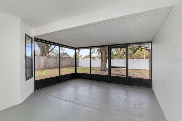 unfurnished sunroom with a healthy amount of sunlight