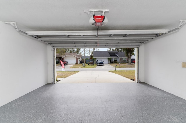 garage featuring a garage door opener