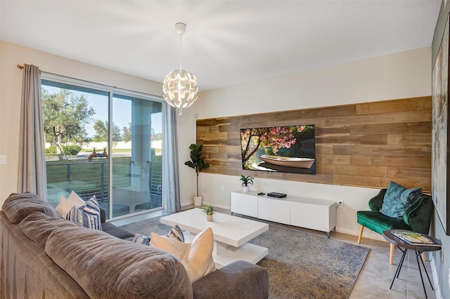 living room with an inviting chandelier