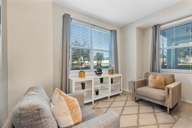 living area with light tile patterned floors