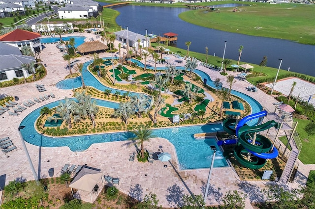 birds eye view of property featuring a water view