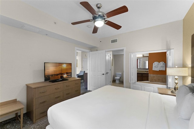 bedroom featuring connected bathroom and ceiling fan