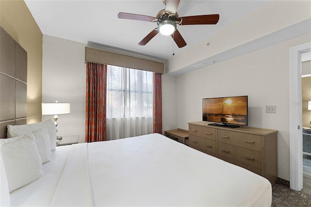12527 Floridays Resort Dr Unit E-103, Orlando, FL 32821 - bedroom featuring a ceiling fan