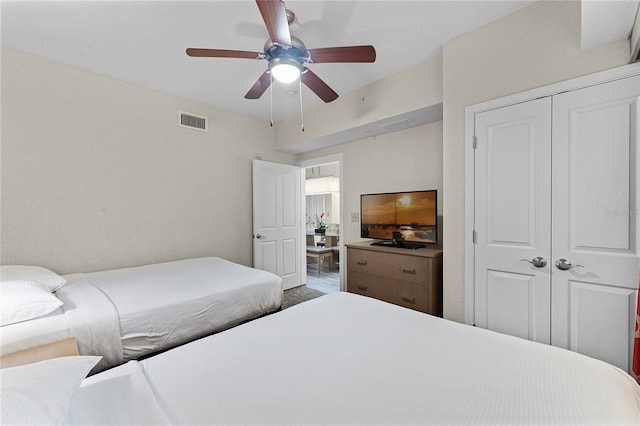 bedroom with a closet and ceiling fan