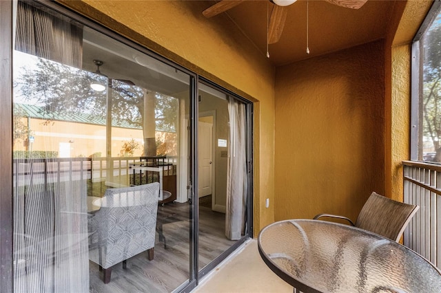 balcony featuring ceiling fan