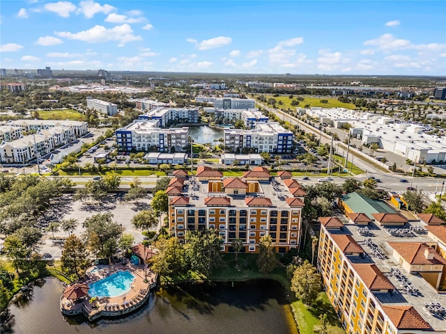 birds eye view of property featuring a water view