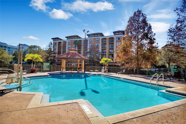 12527 Floridays Resort Dr Unit E-103, Orlando, FL 32821 - community pool with a patio and a gazebo