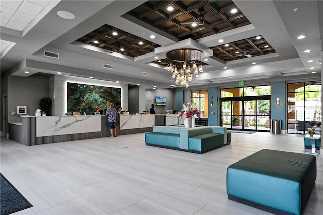 12527 Floridays Resort Dr Unit E-103, Orlando, FL 32821 - common area with coffered ceiling and recessed lighting