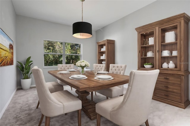 view of carpeted dining space