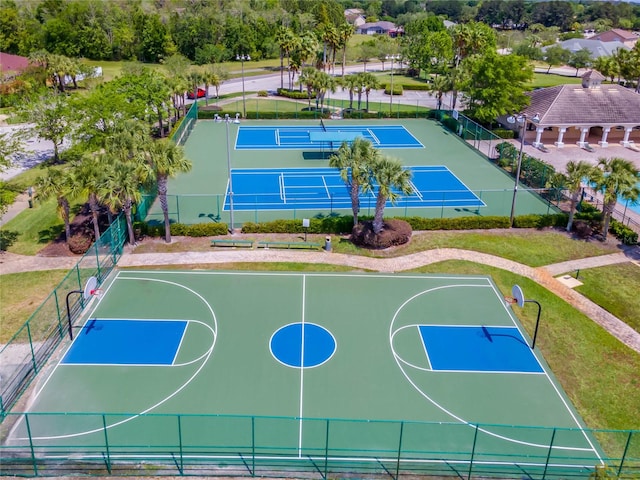 view of sport court featuring tennis court