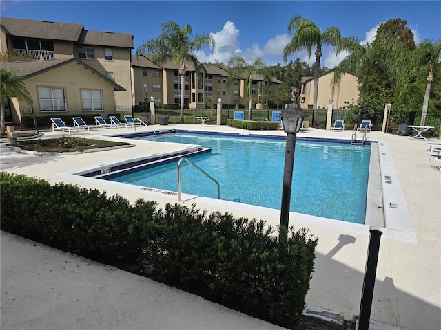 623 Dory Ln Unit 112, Altamonte Springs, FL 32714 - community pool featuring fence, a residential view, and a patio area