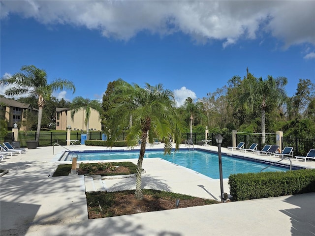 view of swimming pool featuring a patio